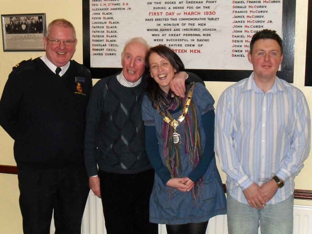 The four speakers relax after the event in front of the Shackleton plaque.